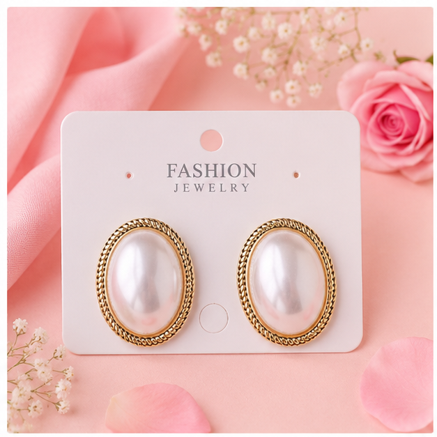 Studs Earrings 
Oval white pearls studs earrings